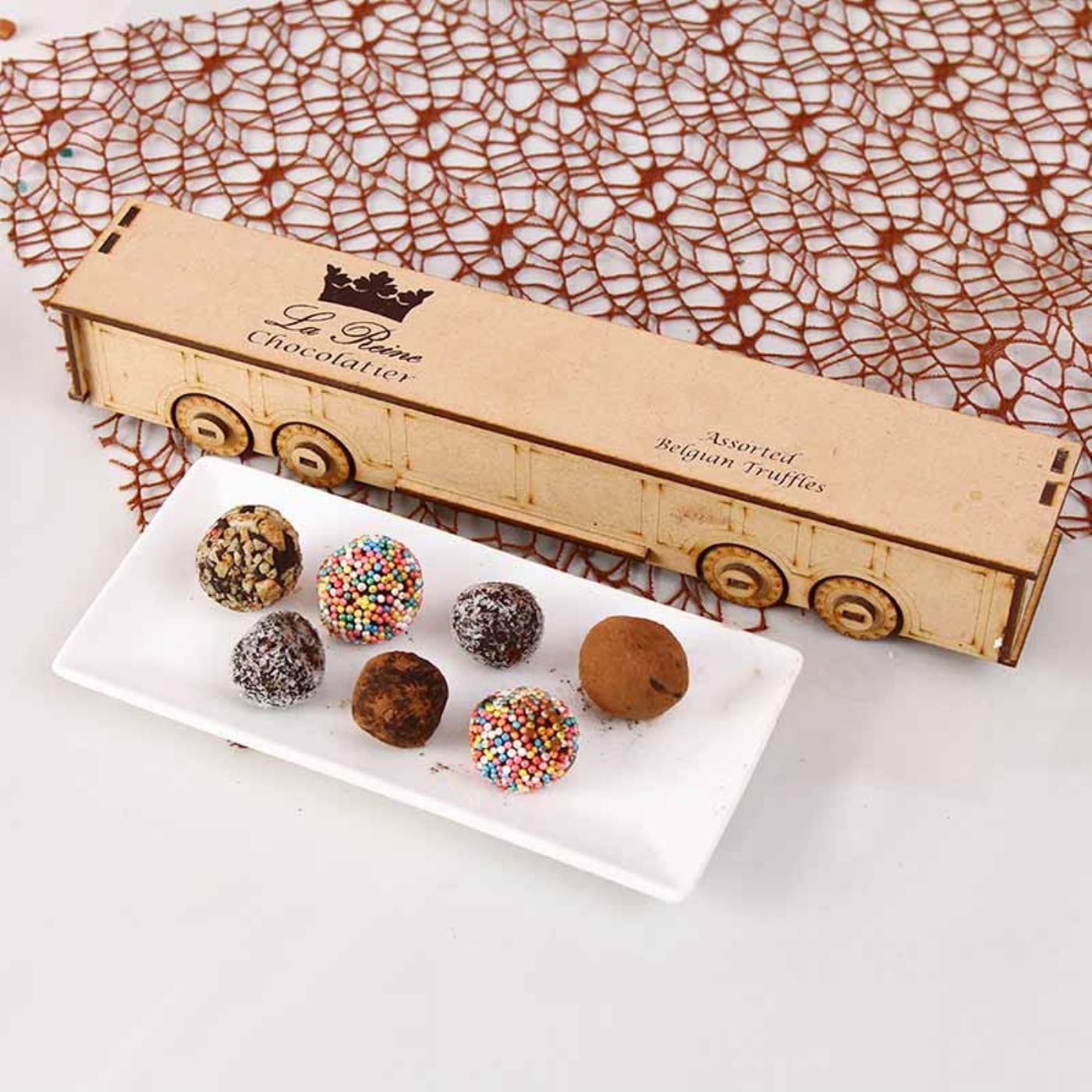 wooden box of assorted chocolate balls: gift/send gourmet gifts