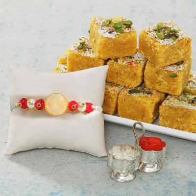 Beautiful Stone Rakhi With Moong Badam Barfi And Tikka Holder Gift