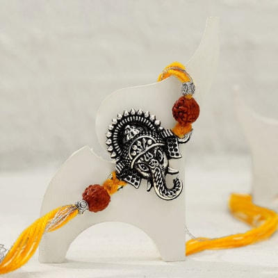 Buy Send Divine Oxidized Ganesha Rakhi With Roli Chawal Online IGP