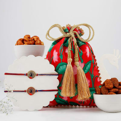 Buy Send Peacock Meena Rakhi Set Of And Joyful Nibbles Hamper Online