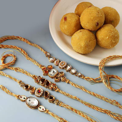 Send Set Of Kundan Rakhi With Besan Ladoo Online Same Day Delivery