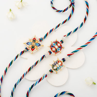 Buy Send Striking Multicoloured Pearl And Meena Work Rakhi Set Of 3