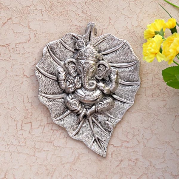 Metal Ganesha Carved on a Leaf - Wall Hanging