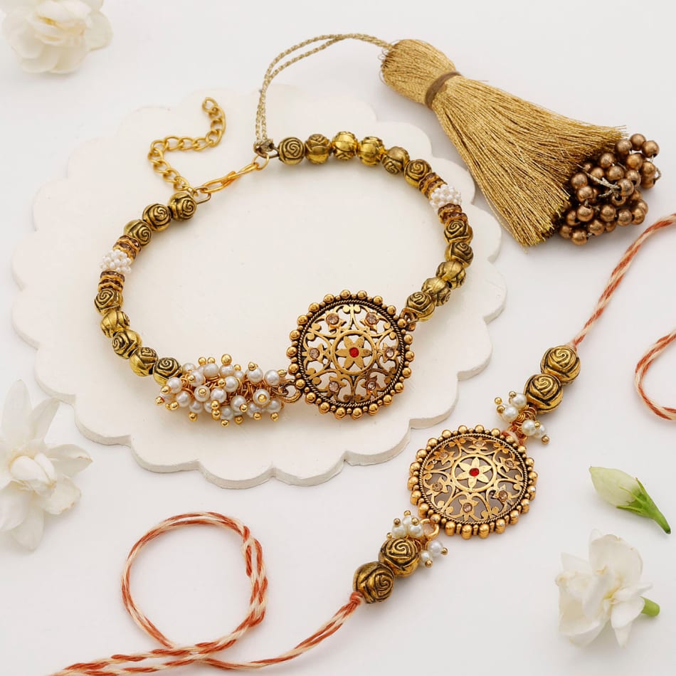 Bhabhi bracelet rakhi with double pearl chain with hanging jhoomki – Odara  Jewellery
