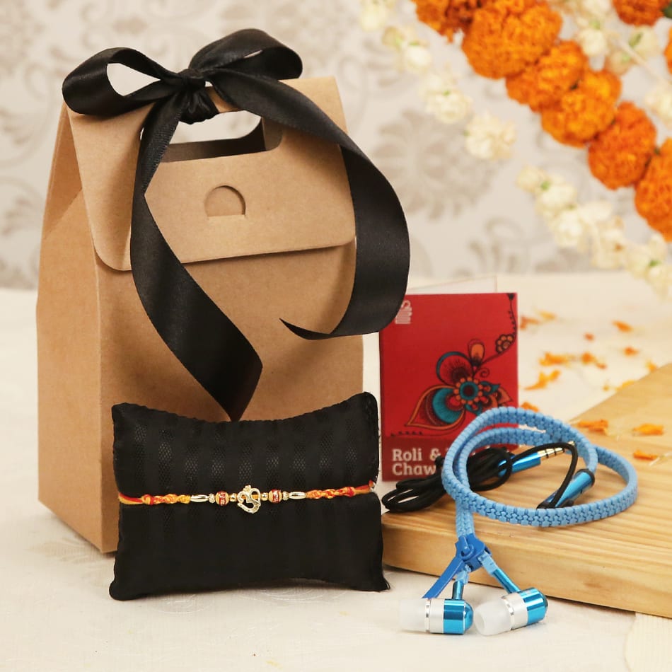Attractive Om Rakhi with Earphones in Goodie Bag: Gift/Send Rakhi