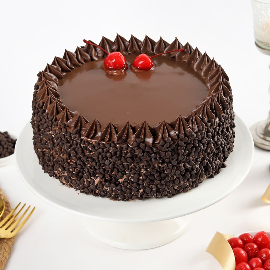 Order Chocolate Cake with Chocolate Chips & Cherry Toppings Half ...