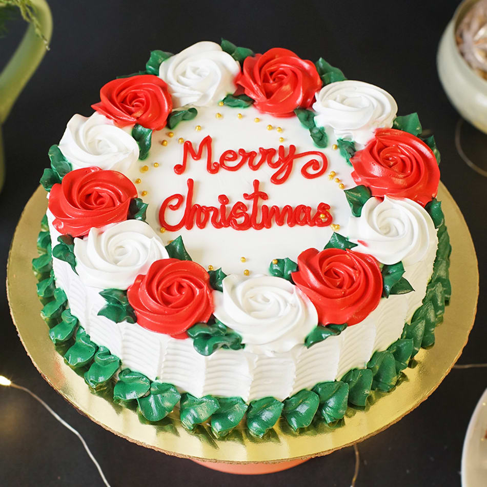 An Illustration Of A Festive Christmas Cake In Greeting Card Format  Decorated With Red Ribbon And Seasonal Holly With A Green Snowy Background  Royalty Free SVG, Cliparts, Vectors, and Stock Illustration. Image