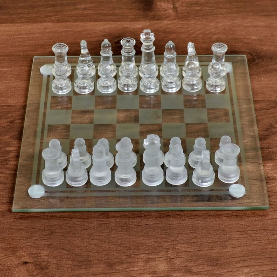 Premium Photo  Chess piece, compass and sand glass on board