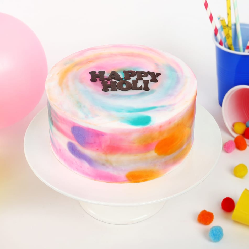 New Bakery delights by Disha - Chocolate glaze on cream cake with colourful  Holi theme #cake #cakes #birthdaycake #cakedecorating #chocolate #food  #dessert #cakesofinstagram #birthday #instafood #cakedesign #cakestagram  #foodporn #baking #instacake ...