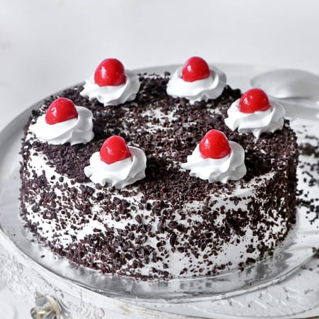 Order Half Kg Heart embedded black forest round cake at ₹599 Online From  Unrealgift