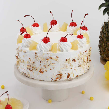 Order Eggless Fresh Cream Pineapple Cake Online at Best Prices in India |  Theobroma
