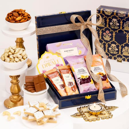 diwali hamper with golden rangoli