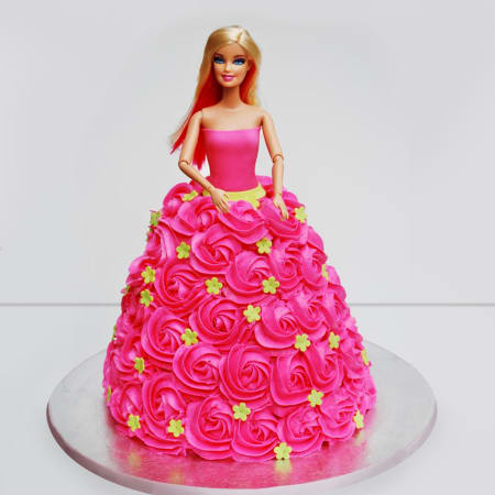 Barbie Doll birthday cake decorated with smarties and hundreds and  thousands Stock Photo - Alamy