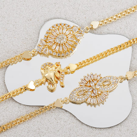 Gold Evil Eye Rakhi Set For Bhaiya - Includes Thread Rakhi, Roli, Chawal & Greeting Card