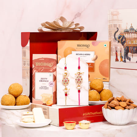 Temple Design Rakhi With Scrumptious Goodies Hamper-image-33