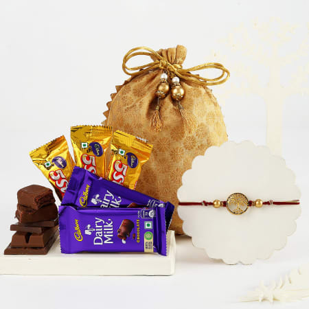 Fabbites Rakshabandhan Chocolate Gift Hamper with 4 Designer Rakhi and  Roli,Chawal- Premium Chocolates/For Bhai/Brother-Set of Rakhi with Tilak  And Chawal for Brother : Amazon.in: Grocery & Gourmet Foods
