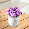 4 lilac roses in a hat box Online