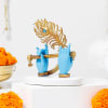 Buy Alluring Gold-Toned Lord Krishna Hands And Sweets Combo