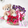 Assorted Roses with Dairy Milk & Teddy in Basket Online