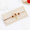 Buy Auspicious Ganesha Rudraksha Rakhi With CZ Stones