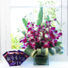 Beautiful 6 Purple Orchids in a Vase with Chocolate Bars Online