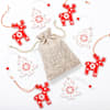 Buy Christmas Potli Of Sweet Delights Hamper