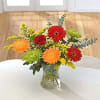 Citrus Zing Flower Arrangement in Glass Vase Online