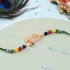 Colourful Beads Flute Rakhi Online