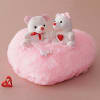 Cute Teddy Bears on a Pink Heart Online