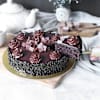 Shop Decadent Chocolate Truffle Cake And Red Roses Bouquet Combo