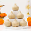 Buy Delectable Badam Modak 12 pcs