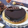 Buy Delicious Truffle Cake With Bunch Of White Roses