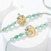 Gift Divine Blessings Ganesha Rakhis Hamper