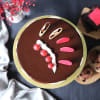 Shop Elegant Truffle Cake With Bunch Of Red Carnations (Half kg)