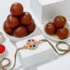 Enchanting Navratna Rakhi And Gulab Jamun Combo Online