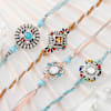 Enthralling Blue Stone Rakhi Set Of 4 Online