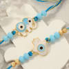 Gift Evil Eye Elephant and Hamsa Rakhi Set Of 2