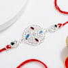 Gift Floral Cutwork Rakhi With Besan Laddus