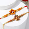 Gift Flower And Ganesha Rakhi With Dry Fruits