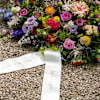 Funeral spray - arrangement with ribbon Online