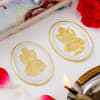 Shop Ganesha And Lakshmi Bhaiya Bhabhi Rakhi Hamper With Silver Coins