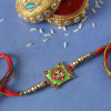 Ganesha Rakhi with Meena Work & Golden beads Online
