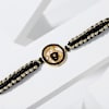 Gold And Black Meena Tirupathi Rakhi Online