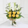 Gift Half Kg Round Shape Butterscotch Cake with Mixed Flowers In A Vase
