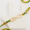 Gift Infinity Symbol Rakhi And Bamboo Plant With Dry Fruits