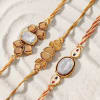 Gift Intricate Kundan Rakhis And Besan Laddoo Combo