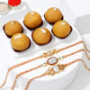 Intricate Kundan Rakhis And Besan Laddoo Combo Online