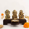 Laxmi, Ganesha, And Saraswati Metal Idol With Diya Online