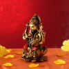 Buy Lord Ganesha Idol Sitting on Lotus Flower