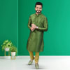 Shop Lord Ganesha Metal Rakhi With Green Kurta Set